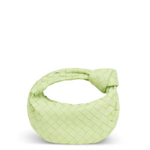 Small light green leather bag by Bottega Veneta with a knot design in the handle.