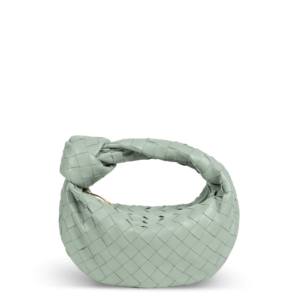 Sac en cuir vert pastel de la marque Bottega Veneta avec un design de nœuds dans la poignée.
