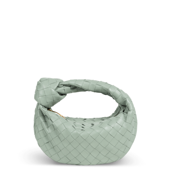 Pastel green leather bag by Bottega Veneta with a knot design in the handle.