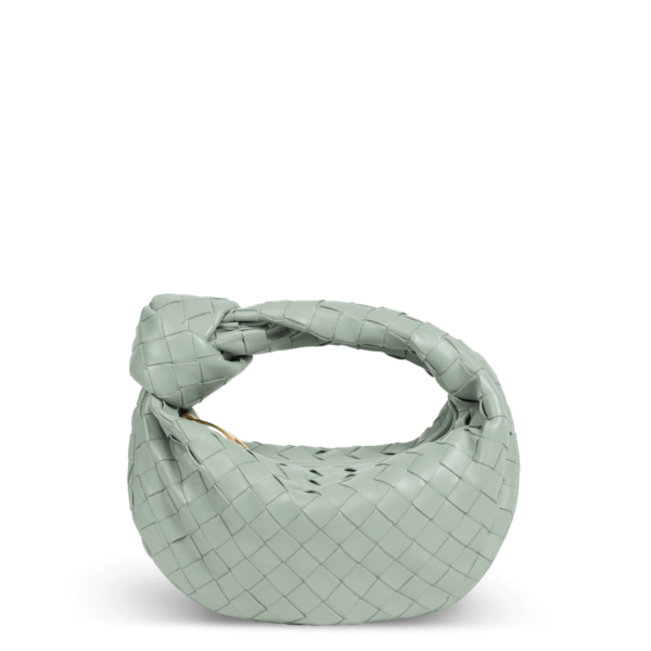 Sac en cuir vert pastel de la marque Bottega Veneta avec un design de nœuds dans la poignée.
