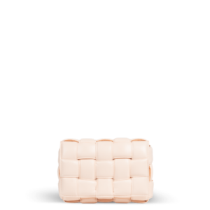 A leather handbag in a braided pattern and light peach shade from the Bottega Veneta brand.
