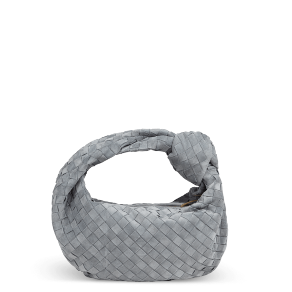 Gray suede bag by Bottega Veneta with a knot design on the handle.