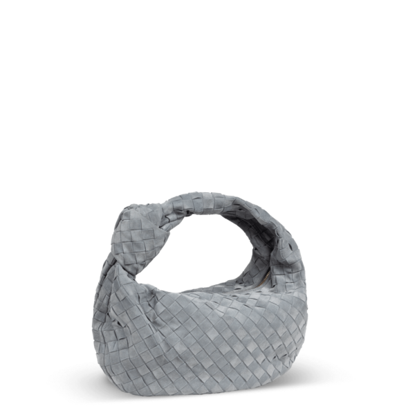 Gray suede bag by Bottega Veneta with a knot design on the handle.