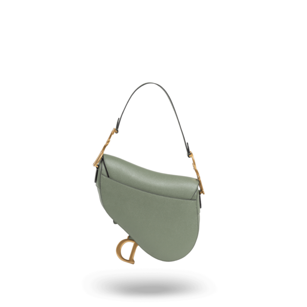 A green handbag with gold hardware from the Dior brand.