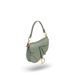 A green handbag with gold hardware from the Dior brand.