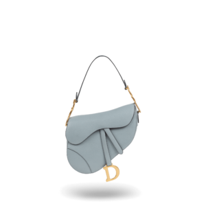 A light blue handbag with gold hardware from the Dior brand.