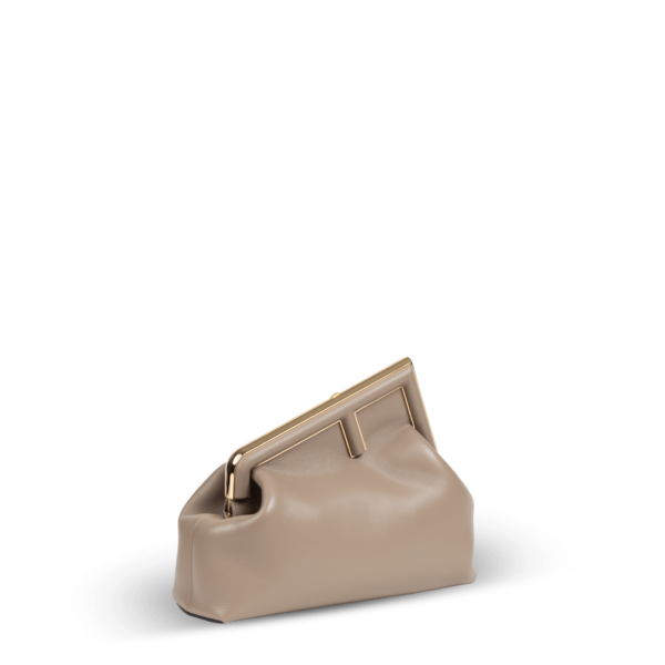 A beige clutch bag with gold hardware from the Fendi brand.