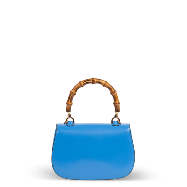 Blue leather handbag with bamboo handle by Gucci.