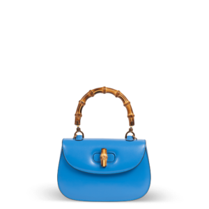 Blue leather handbag with bamboo handle by Gucci.