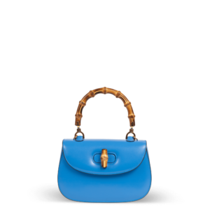 Sac à main en cuir bleu avec poignée en bambou de la marque Gucci.