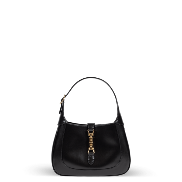 Black leather shoulder bag with gold hardware from the Gucci brand.