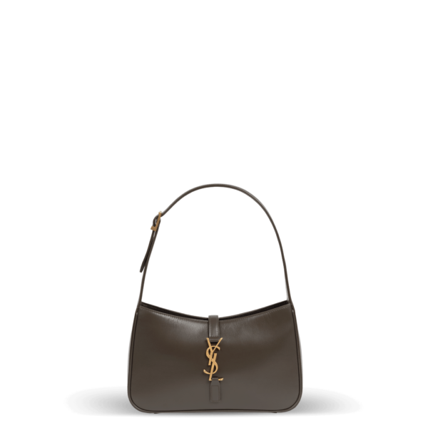 A small shoulder bag in brown leather and gold hardware from the Saint Laurent brand.